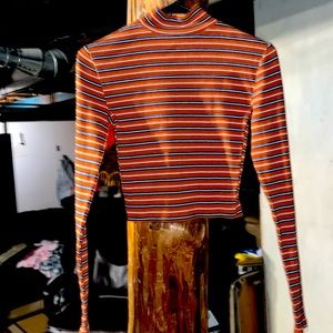 Orange striped turtle neck long sleeve